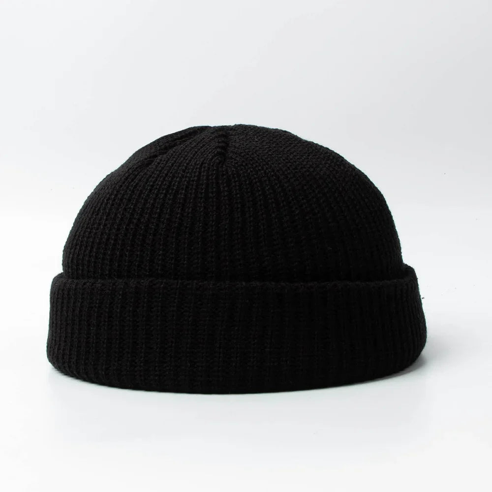 Versatile unisex knitted skull cap beanie. Ideal warm headwear accessory for men & women in winter.