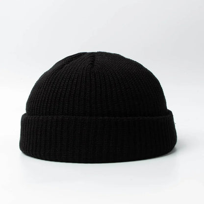 Versatile unisex knitted skull cap beanie. Ideal warm headwear accessory for men & women in winter.