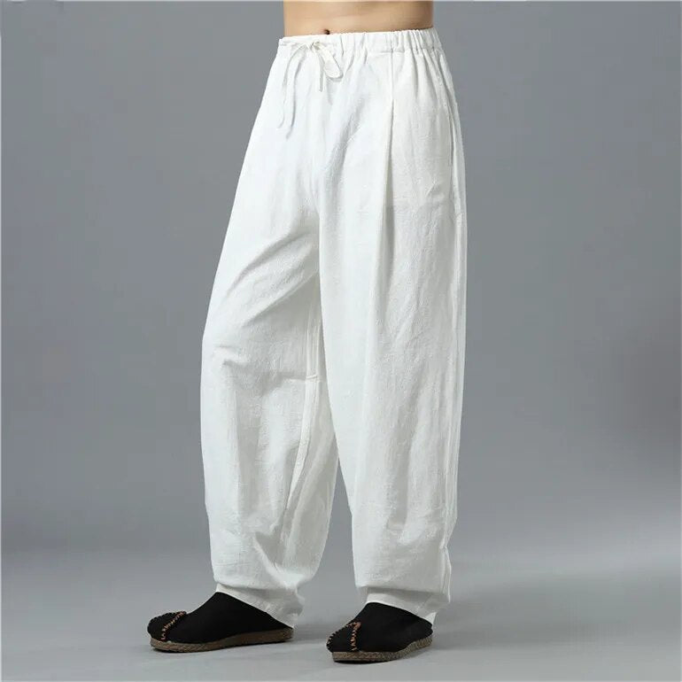 Close-up of deep pocket on unisex Kodama baggy pants, combining practicality with relaxed, trendy style.