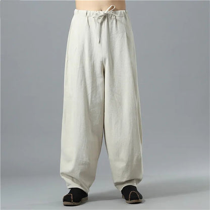 Flat lay of unisex Kodama baggy pants, showcasing relaxed fit, soft material, and versatile everyday fashion.