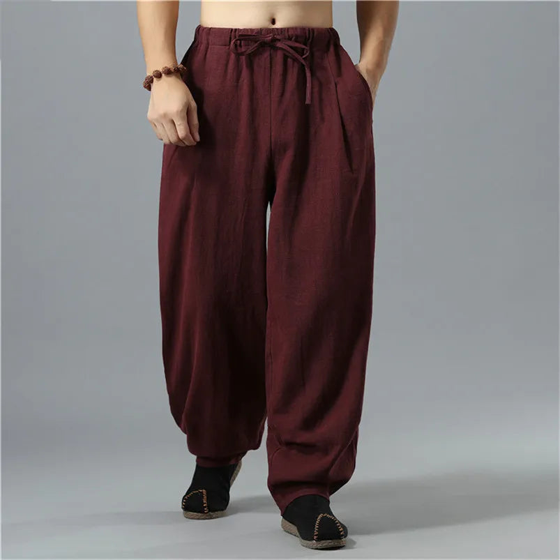 Unisex model wearing trendy Kodama baggy pants with a casual top, perfect for everyday fashion.