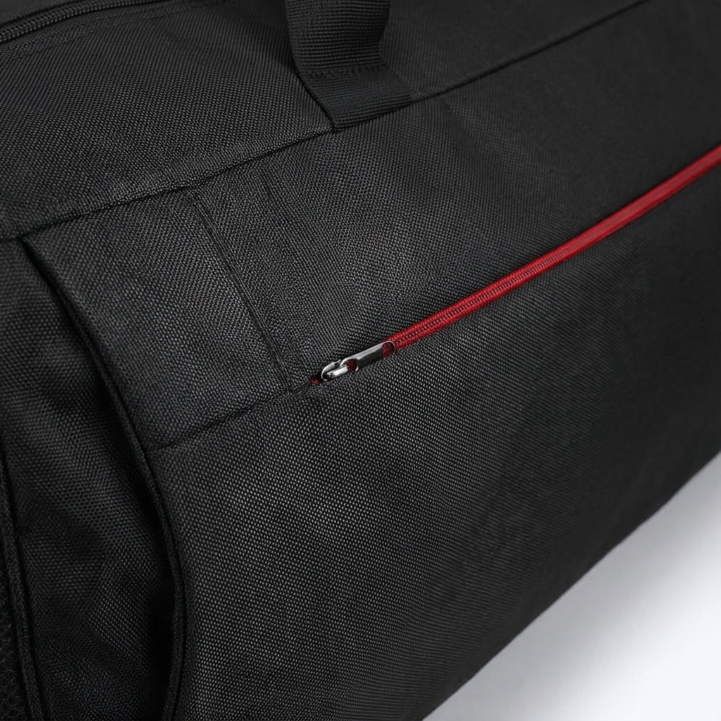 Large 45L black unisex duffle bag for sports, gym, or weekend travel. Waterproof with convenient shoe compartment.