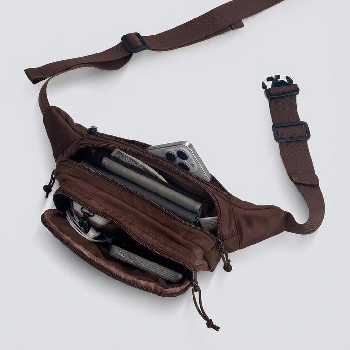 Versatile unisex fanny pack worn as a waist, crossbody, or shoulder bag for everyday carry and travel.