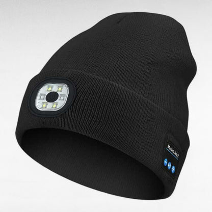 Close-up of the control buttons on a unisex LED Bluetooth beanie, indicating easy operation, for running.