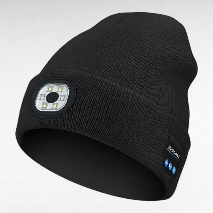 Close-up of the control buttons on a unisex LED Bluetooth beanie, indicating easy operation, for running.