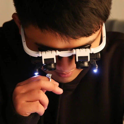 Hands-free LED magnifier for jewelry appraisal, watch repair & electronics. Features multiple magnifications & bright lights.