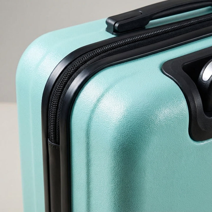Stylish rose gold carry-on suitcase, a lightweight travel bag with spinner wheels for easy maneuvering.