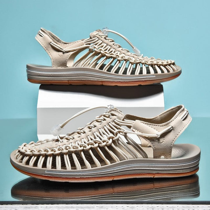 Padded footbed comfort sandals, lightweight for extended wear.