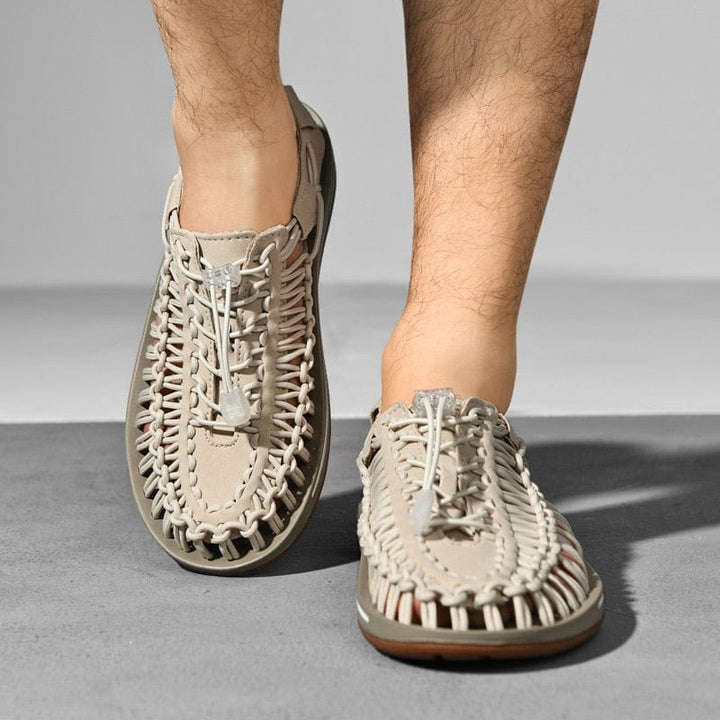 Black unisex comfort sandals, ideal lightweight footwear for casual strolls.