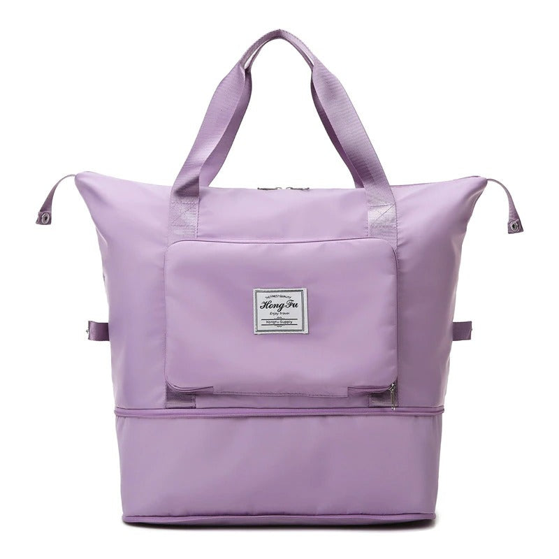 Durable waterproof travel bag, expandable for extra space. Unisex, perfect as a weekender or gym bag.