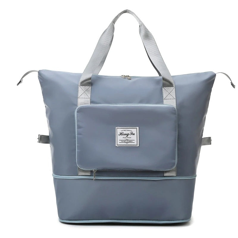 Unisex waterproof weekender bag. Expandable design, ideal for travel, gym, or overnight stays. Compact.