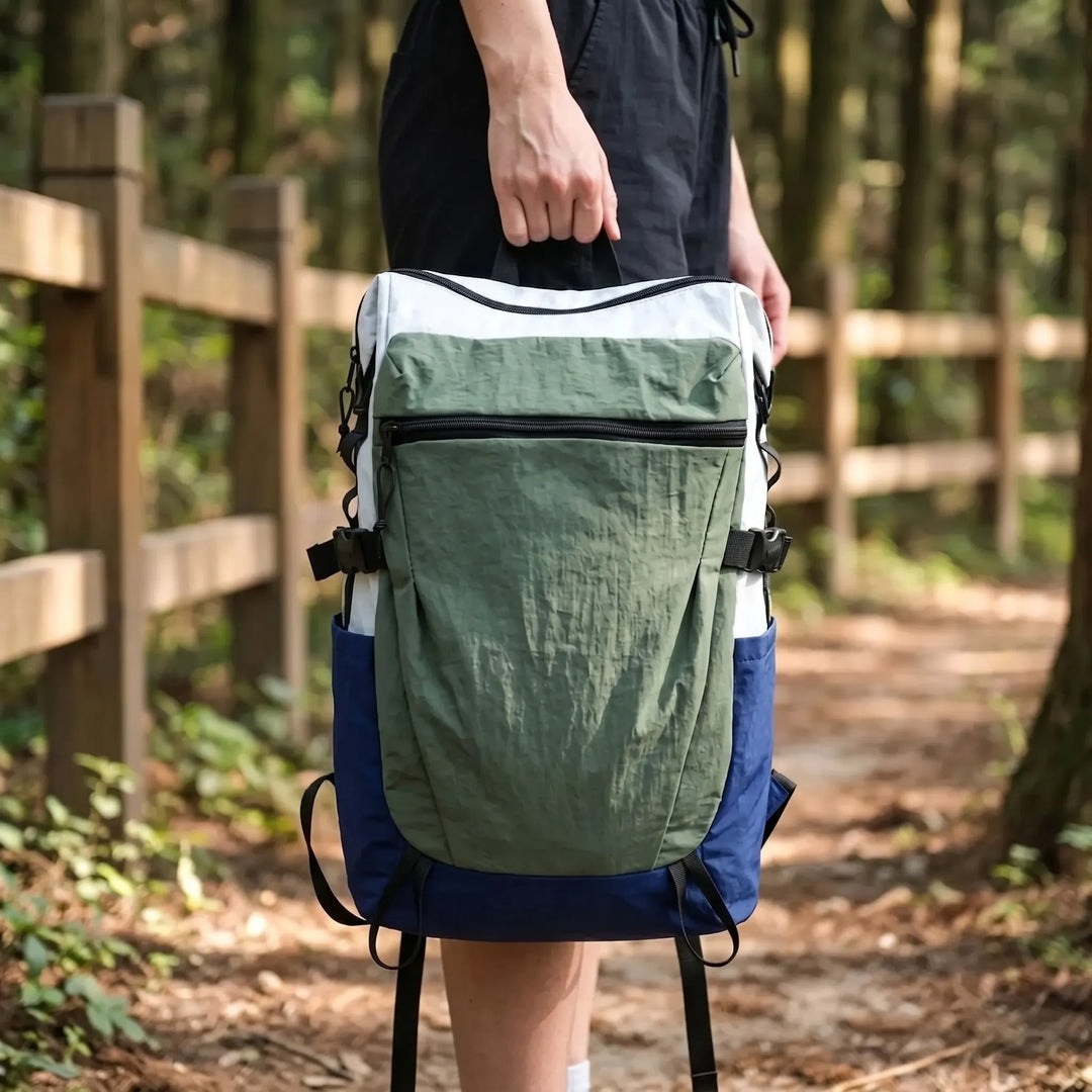 Unisex lightweight hiking daypack for outdoor adventures & daily commutes. Durable nylon travel backpack.