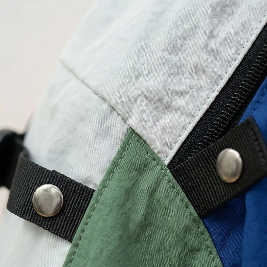 Versatile commuter daypack for daily travel & city exploration. Unisex, lightweight, durable nylon backpack.