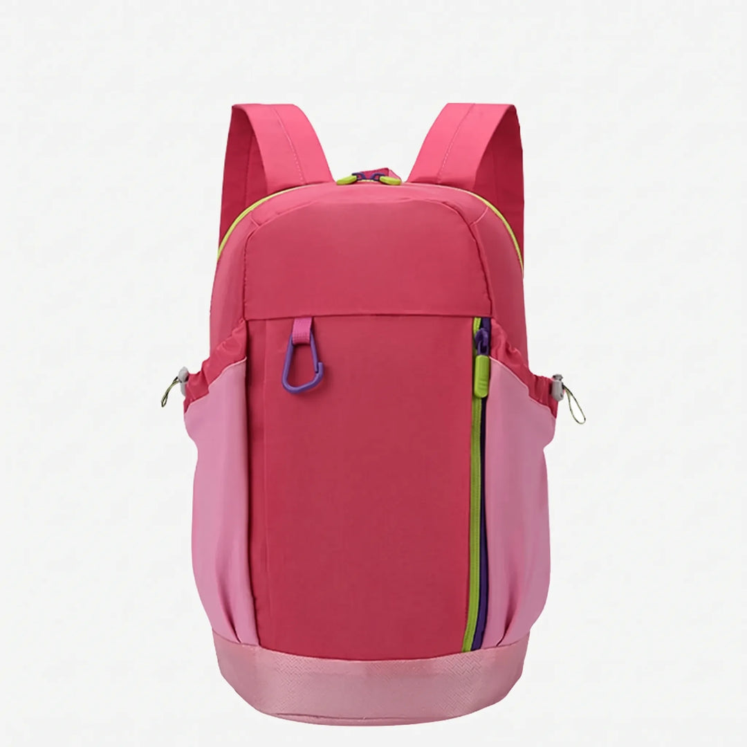 Person wearing a lightweight unisex hiking daypack on a scenic mountain trail.