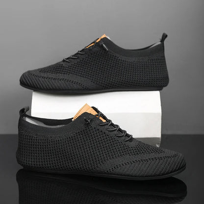 Ergonomic lightweight mesh knit slip-on sneakers, providing unisex comfort & support.