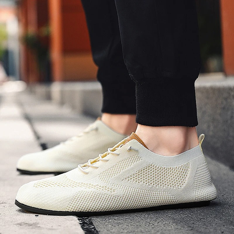 Durable yet lightweight mesh knit slip-on sneakers, unisex casual footwear for active lifestyles.