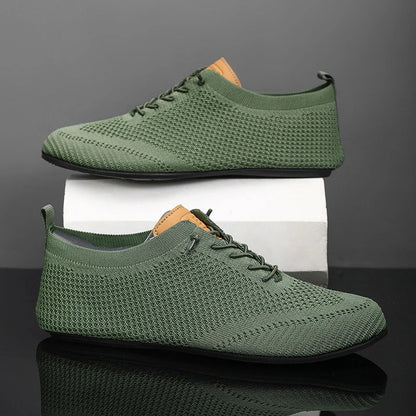 Minimalist design unisex lightweight mesh knit slip-on sneakers, versatile for any casual outfit.