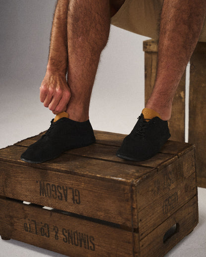 Athletic casual slip-on knit sneakers, offering lightweight comfort for everyday wear.