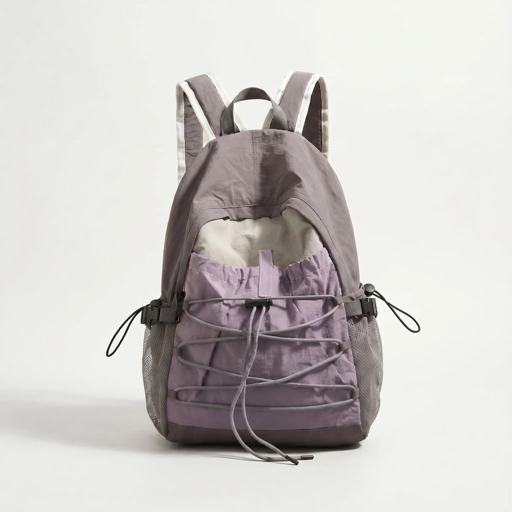 Compact outdoor hiking daypack, durable nylon for adventure & daily use.