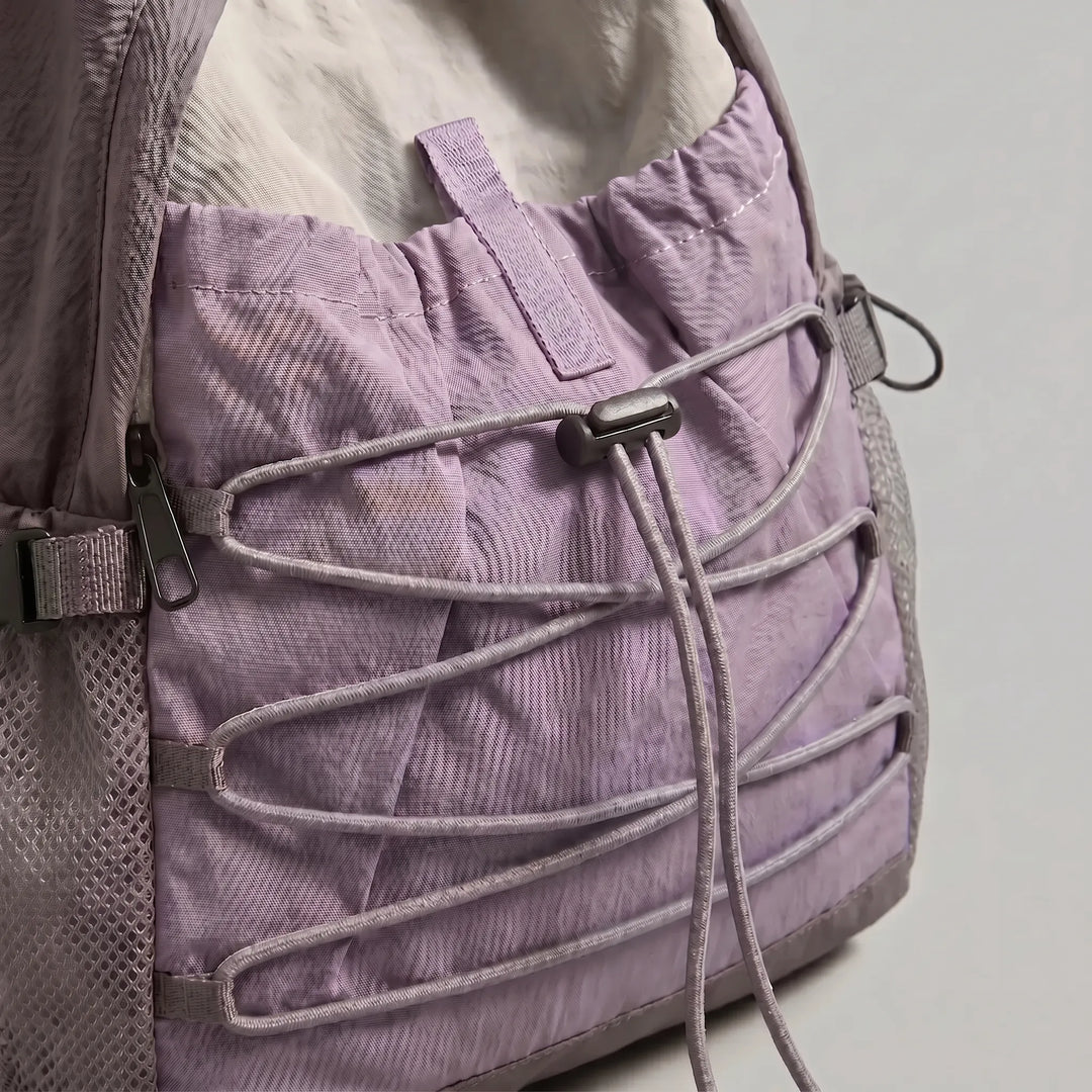 Lightweight travel daypack for men & women, suitable for hiking, commute, & outdoor trips.