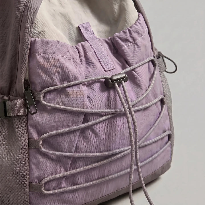Lightweight travel daypack for men & women, suitable for hiking, commute, & outdoor trips.