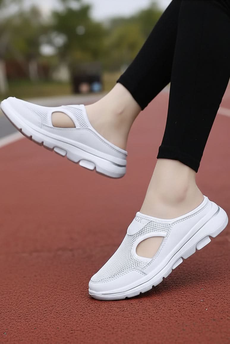 Soft, lightweight unisex indoor slippers designed for ultimate foot comfort & support.
