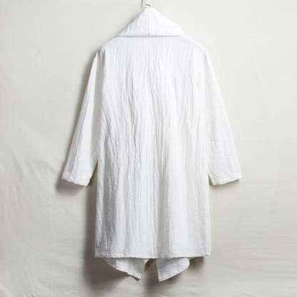 Boho-chic unisex linen cloak with hood. Relaxed fit, versatile for effortless style and comfort.
