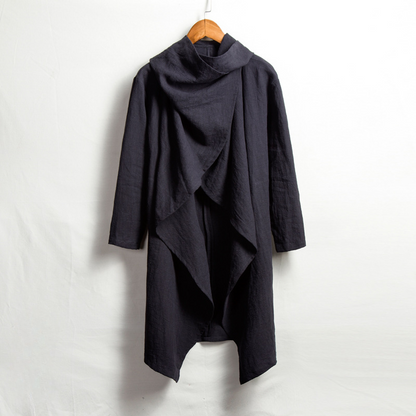 Simple, elegant unisex hooded linen cloak. Perfect for versatile layering and effortless style.