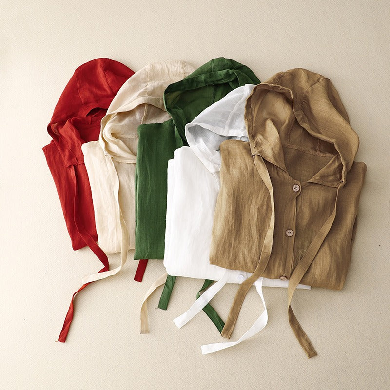 Relaxed fit unisex linen hooded shirt. Lightweight and breathable, perfect for summer casual wear and beach layering.