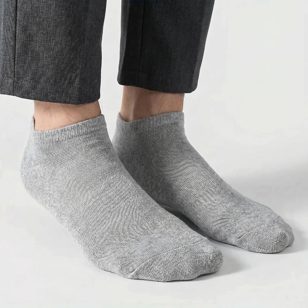 Breathable multi-pack unisex low-cut ankle socks, ideal for athletic activities and casual comfort.