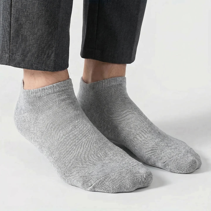 Breathable multi-pack unisex low-cut ankle socks, ideal for athletic activities and casual comfort.