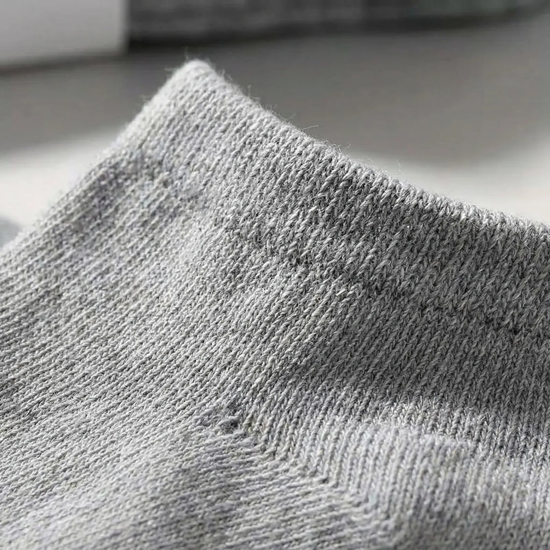 Close-up of soft unisex low-cut ankle socks, showcasing their seamless design for ultimate daily comfort.