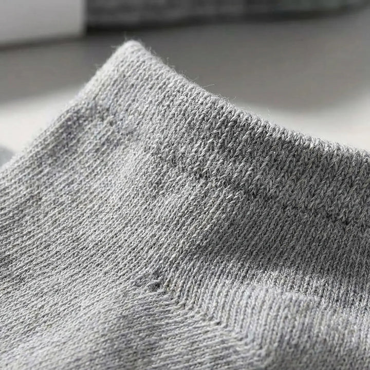 Close-up of soft unisex low-cut ankle socks, showcasing their seamless design for ultimate daily comfort.