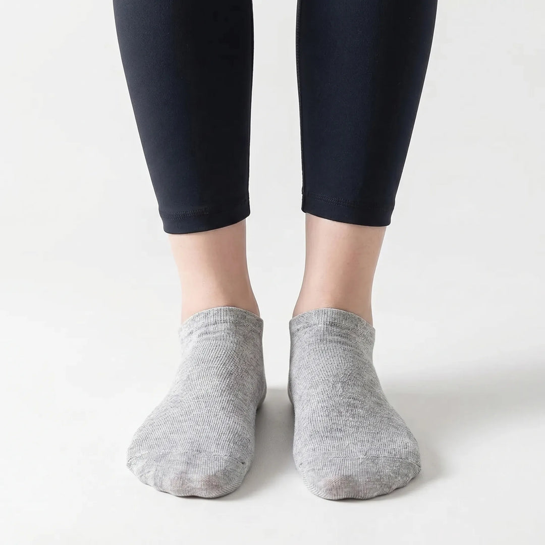 Stylish low-cut ankle socks, offering breathable comfort and a seamless design for unisex casual wear.