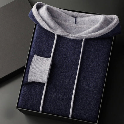 Stack of multi-colored unisex pullover hoodies, soft and warm, perfect for everyday fashion and layering.