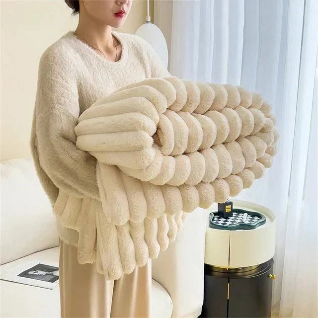 Plush rabbit faux fur comfort blanket, super soft for cozy warmth and relaxation.
