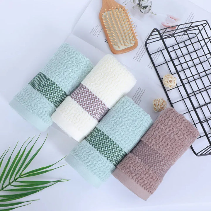 Elegant unisex cotton guest face towel, plush & soft, enhancing luxury bathroom decor.