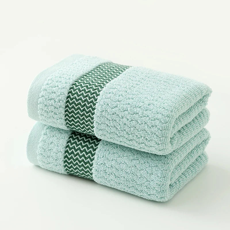 100% cotton plush face towel, quick-dry and super absorbent, offering a gentle touch.