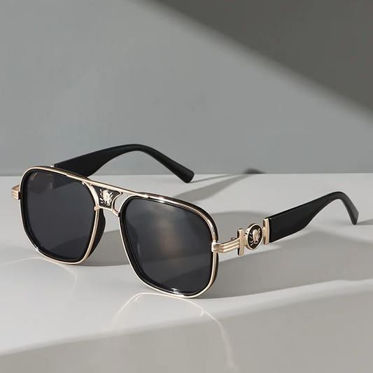 Unisex luxury gradient sunglasses with UV protection, gold accents & sophisticated fashion appeal.