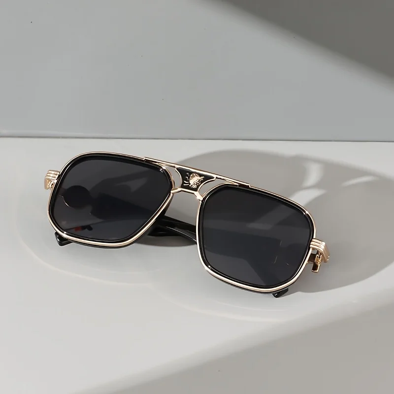 Fashionable unisex luxury gradient sunglasses, offering UV protection, gold accents & a sophisticated look.