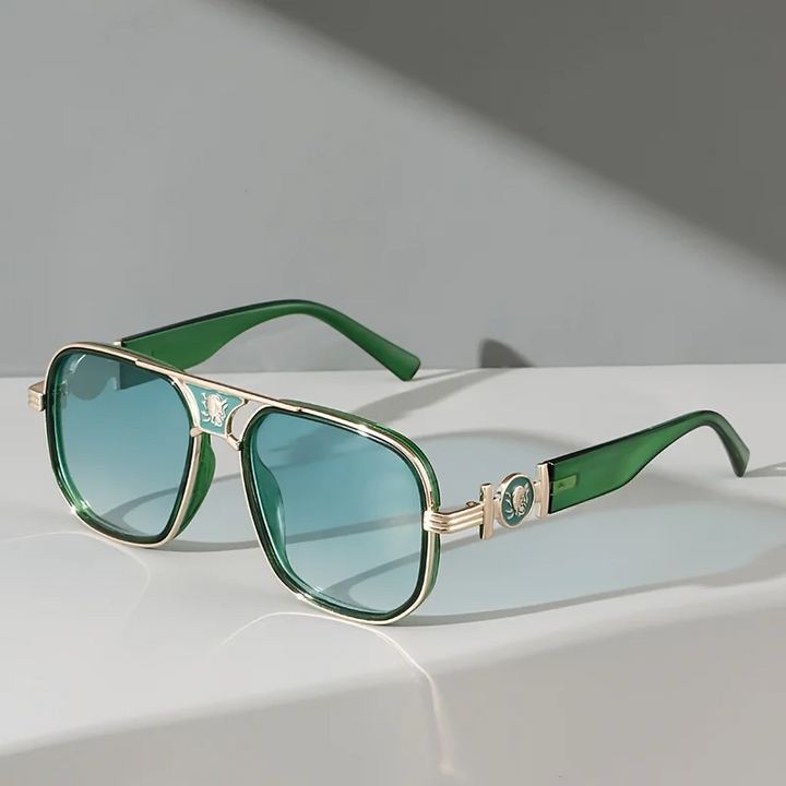 Sophisticated unisex gradient sunglasses featuring luxury gold accents & essential UV protection.
