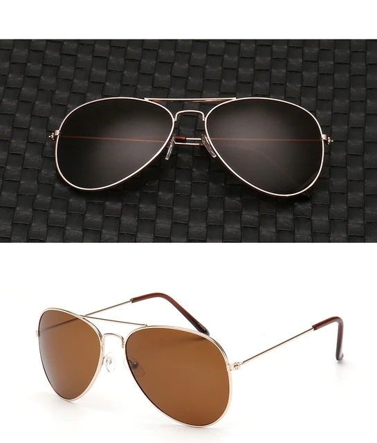 Fashion-forward unisex luxury aviator sunglasses with mirror lenses. Perfect pilot style accessory for any look.