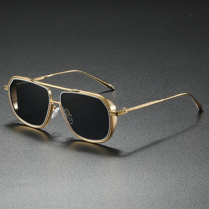 Silver-tone luxury statement sunglasses with UV400 lenses. Essential fashion eyewear for all.
