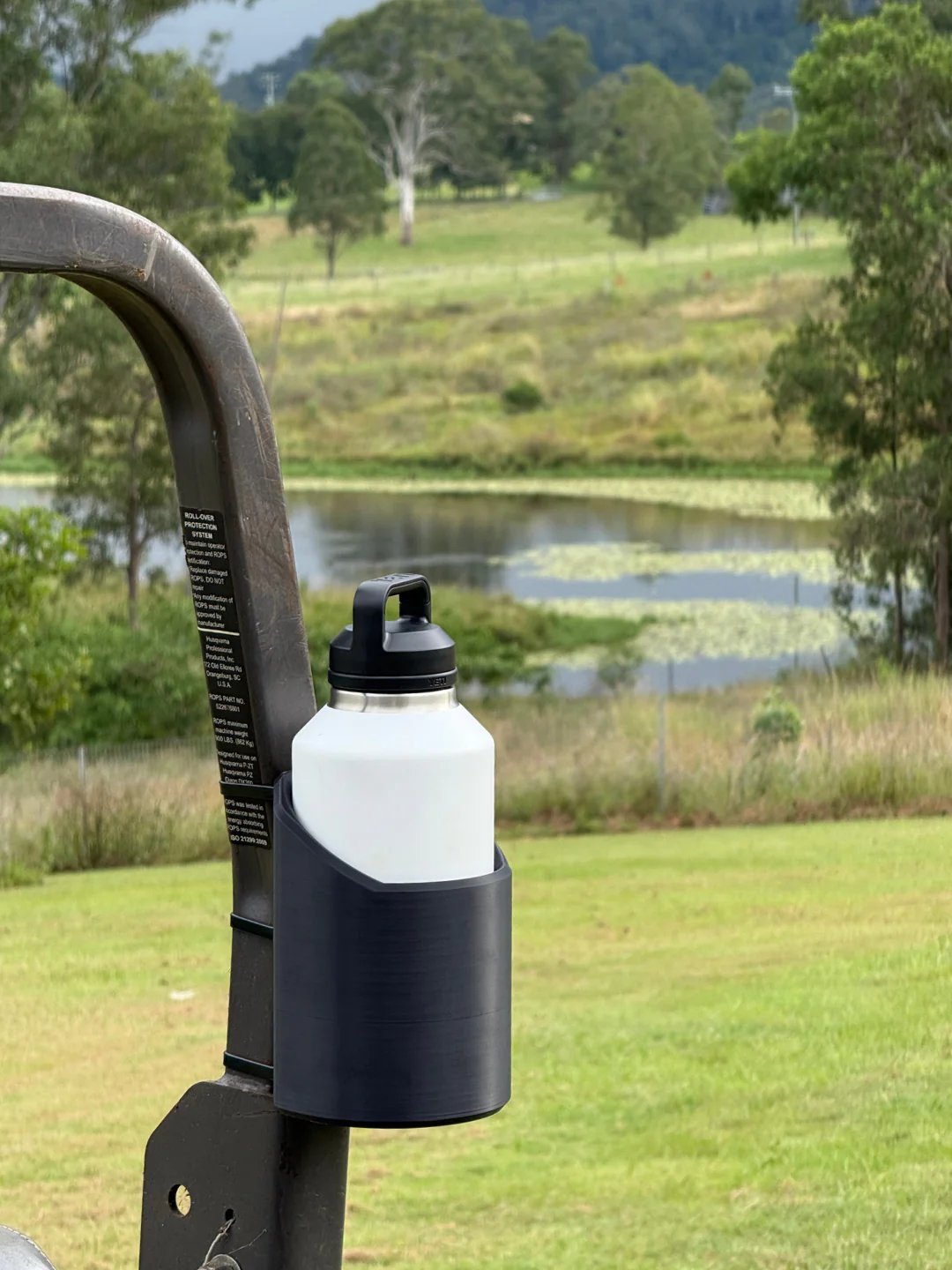 Strong magnetic bottle holder; perfect for gym equipment, garage storage, or workshop tools. Secure grip.