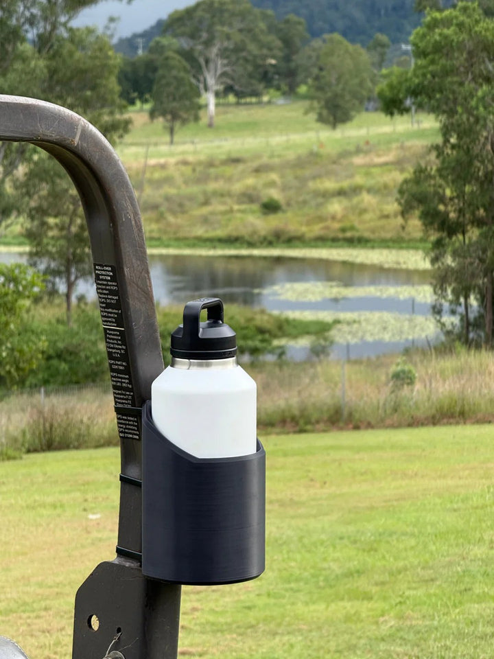 Strong magnetic bottle holder; perfect for gym equipment, garage storage, or workshop tools. Secure grip.