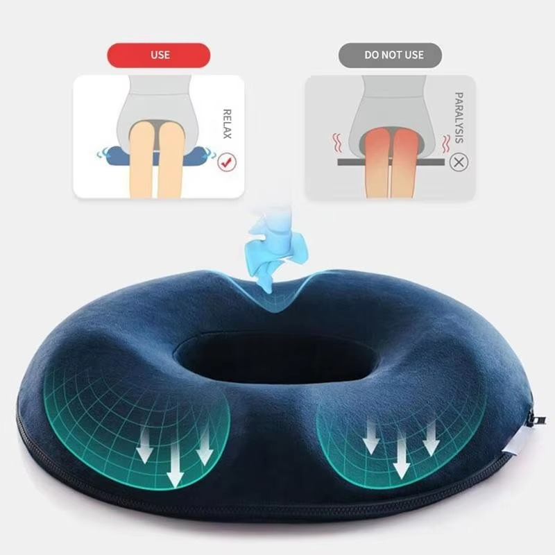 Coccyx support donut cushion made of memory foam for tailbone pain relief.