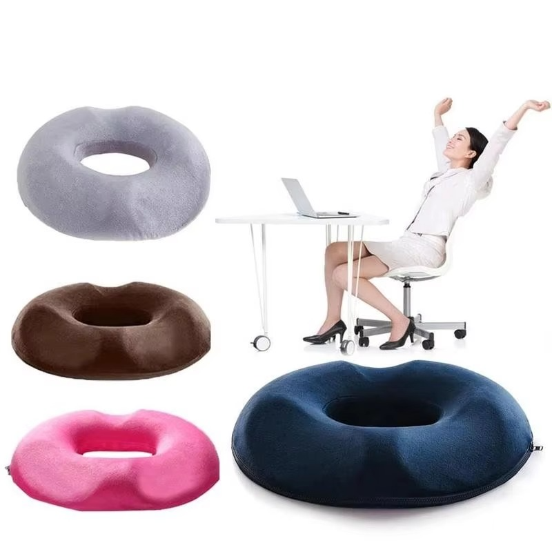 Office chair memory foam donut cushion for ergonomic posture and pressure relief.
