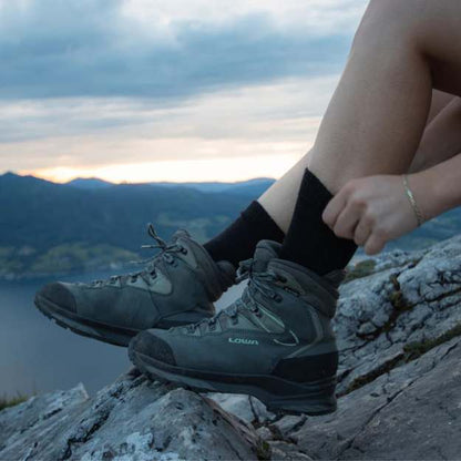 Pair of durable unisex trekking socks made from Merino wool, perfect for hiking