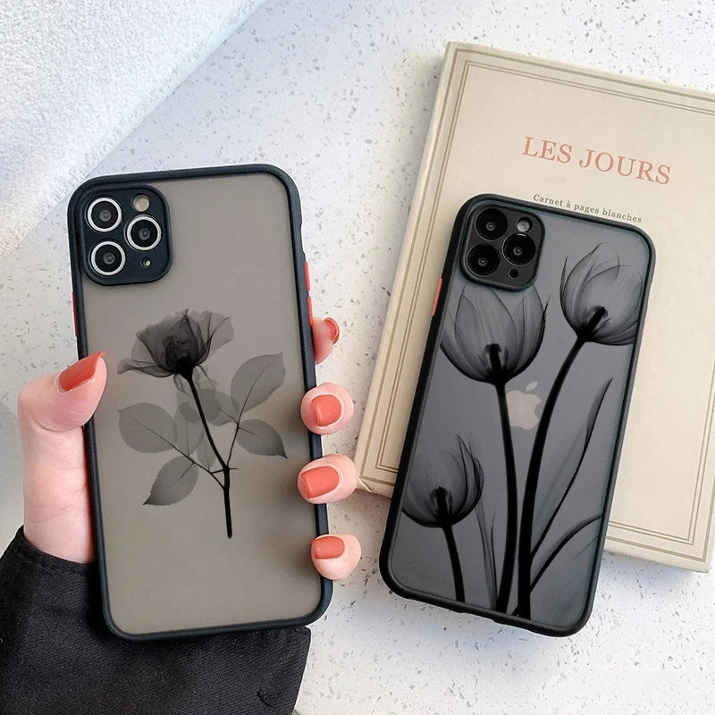 Midnight floral iPhone case with rose & tulip design. Matte, shockproof, MagSafe compatible for phone protection.
