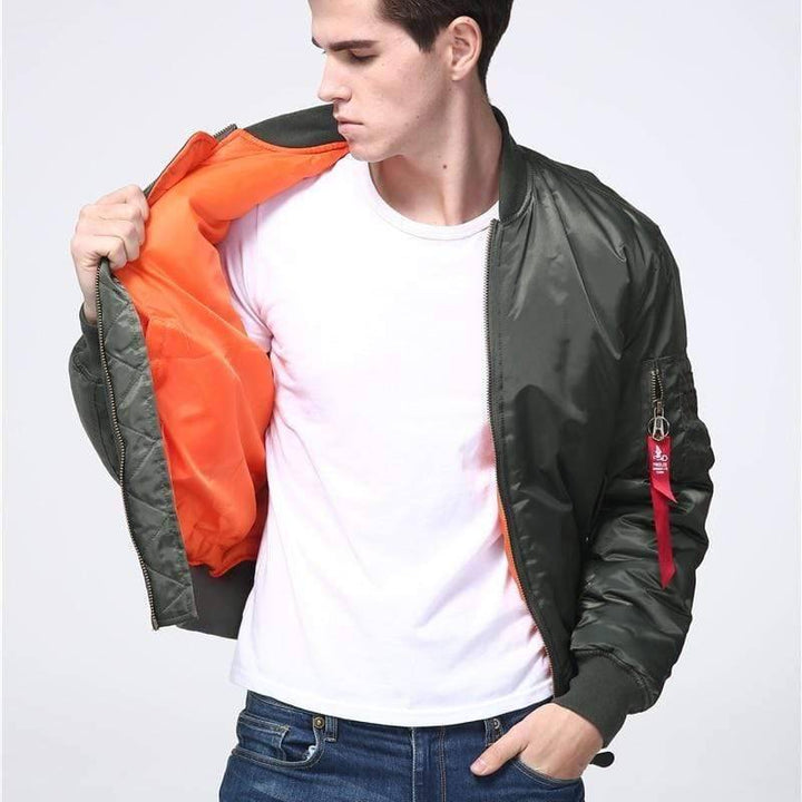 Front view of black unisex flight bomber jacket with ribbed cuffs, a versatile military-style apparel.